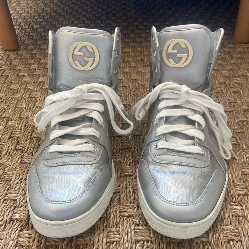 Silver GUCCI high tops in 81/2 (Gucci); America 9 1/2